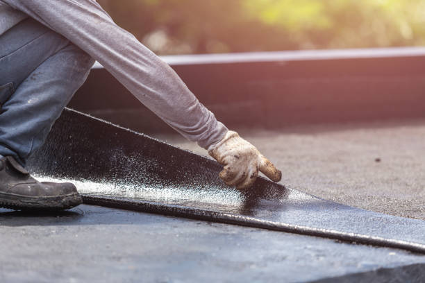 Professional Emergency Waterproofing technician working in Floral Park, NY